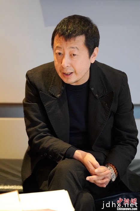 图为贾樟柯受访。中新社记者 彭大伟 摄